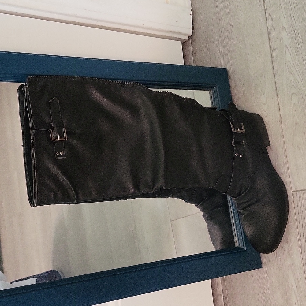 Boots. Up to knee.